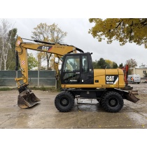 Koparka kołowa Cat Caterpillar M313 D głowica uchylna Powertilt